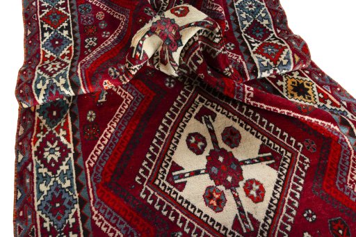 Corner detail of 1970s Shiraz rug showing border pattern and Wool pile