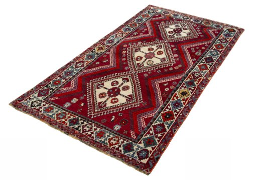Corner detail of 1970s Shiraz rug showing border pattern and Wool pile