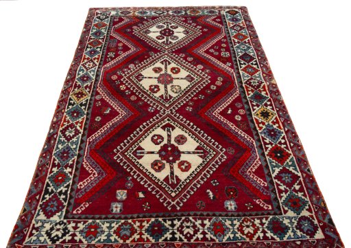 Surface texture of 1970s Shiraz rug with natural Wool and intricate pattern