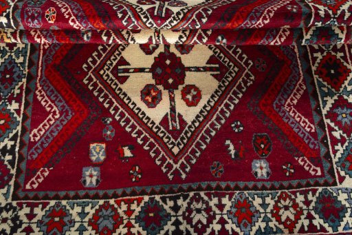Full view of 1970s Shiraz rug from Iran / Persia, 240 × 133 cm in Red tones