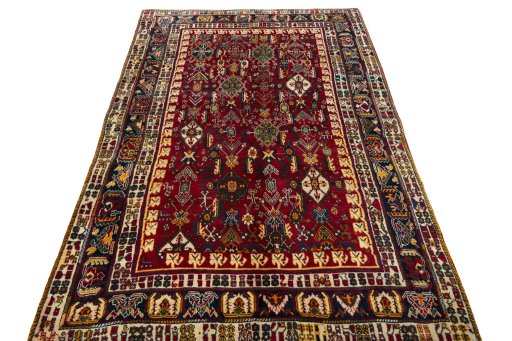 Surface texture of 2000s Shiraz rug with natural Wool and intricate pattern