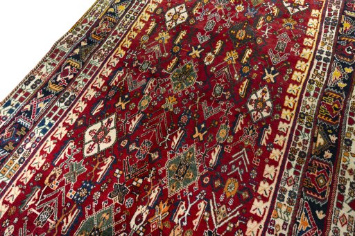 Backside of handmade 2000s Shiraz rug showing knot structure and weave density