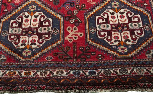 Close-up detail of 2000s Shiraz rug from Iran / Persia showing Wool weave