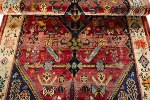 Full view of 2000s Shiraz rug from Iran / Persia, 233 × 156 cm in Red tones