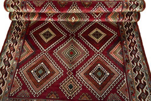 Full view of 2000s Shiraz rug from Iran / Persia, 276 × 158 cm in Red tones