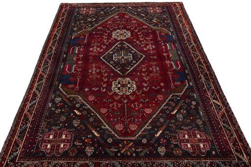 Surface texture of 1970s Shiraz rug with natural Wool and intricate pattern