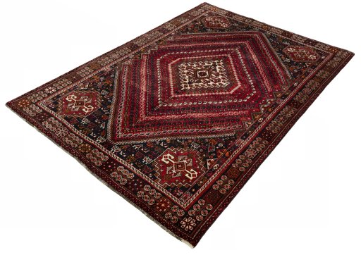 Corner detail of 2000s Shiraz rug showing border pattern and Wool pile