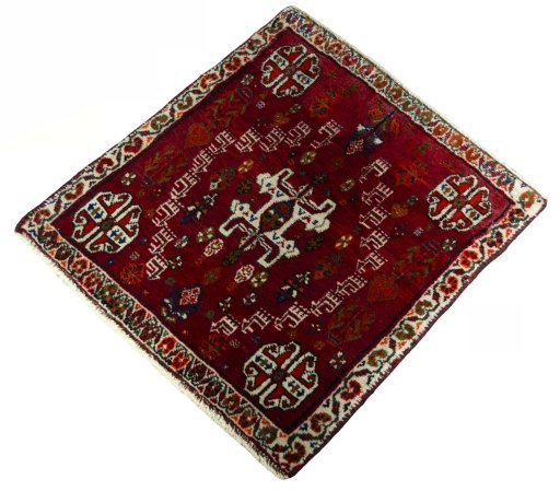 Corner detail of 2000s Shiraz rug showing border pattern and Wool pile