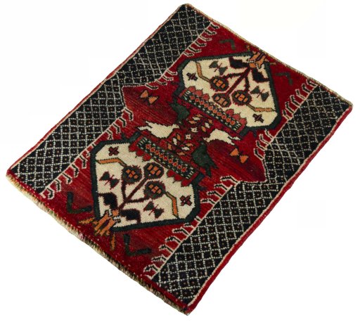 Corner detail of 2000s Shiraz rug showing border pattern and Wool pile