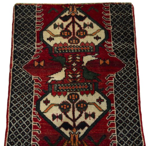 Surface texture of 2000s Shiraz rug with natural Wool and intricate pattern