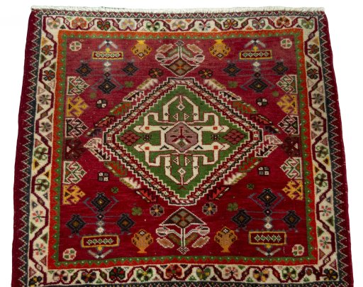 Surface texture of 2000s Shiraz rug with natural Wool and intricate pattern