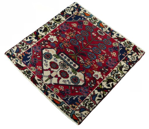 Corner detail of 2000s Shiraz rug showing border pattern and Wool pile