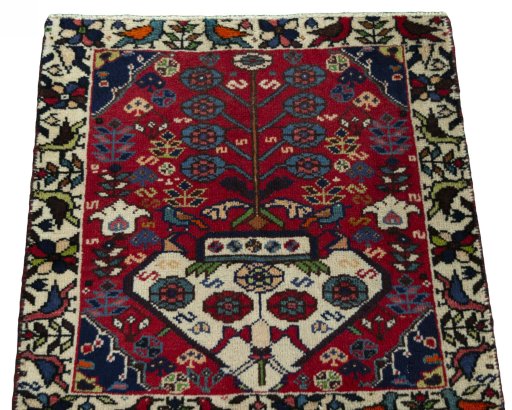 Surface texture of 2000s Shiraz rug with natural Wool and intricate pattern