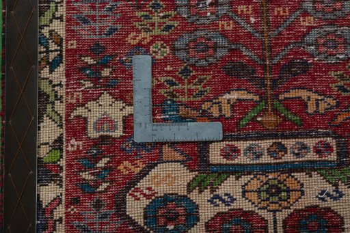 Backside of handmade 2000s Shiraz rug showing knot structure and weave density