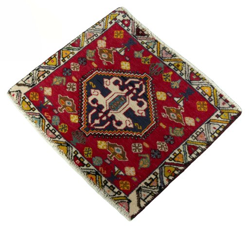 Corner detail of 2000s Shiraz rug showing border pattern and Wool pile