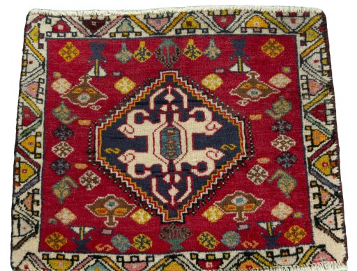 Surface texture of 2000s Shiraz rug with natural Wool and intricate pattern