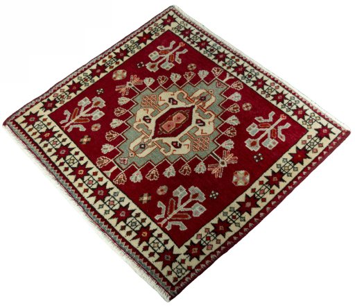 Corner detail of 2000s Shiraz rug showing border pattern and Wool pile