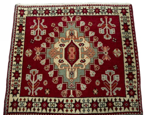 Surface texture of 2000s Shiraz rug with natural Wool and intricate pattern