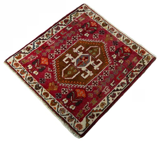 Corner detail of 2000s Shiraz rug showing border pattern and Wool pile