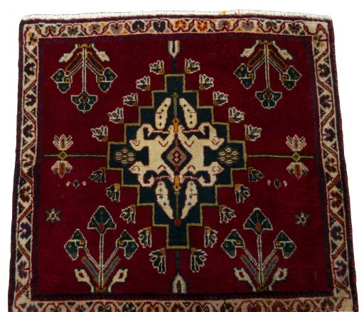Surface texture of 2000s Shiraz rug with natural Wool and intricate pattern
