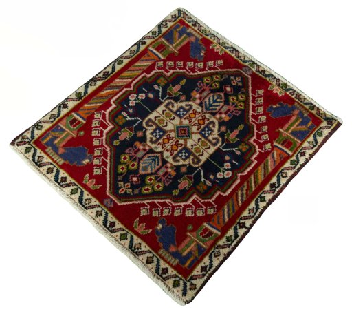 Corner detail of 2000s Shiraz rug showing border pattern and Wool pile