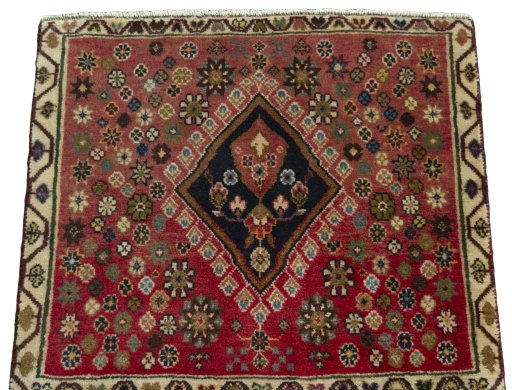 Surface texture of 2000s Shiraz rug with natural Wool and intricate pattern