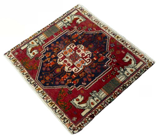 Corner detail of 2000s Shiraz rug showing border pattern and Wool pile
