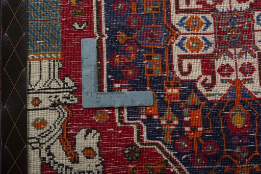 Backside of handmade 2000s Shiraz rug showing knot structure and weave density