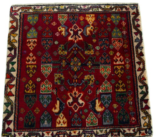 Surface texture of 2000s Shiraz rug with natural Wool and intricate pattern