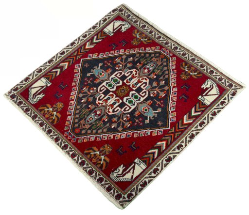 Corner detail of 2000s Shiraz rug showing border pattern and Wool pile