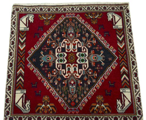 Surface texture of 2000s Shiraz rug with natural Wool and intricate pattern