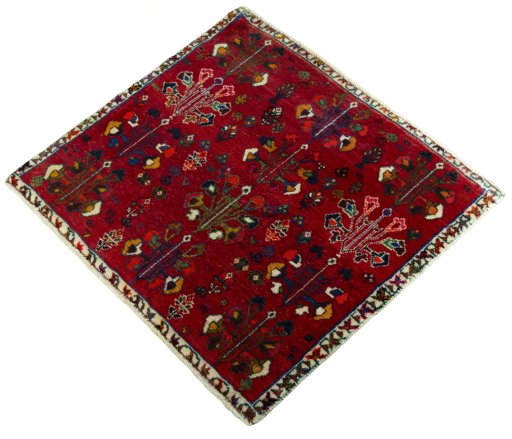 Corner detail of 2000s Shiraz rug showing border pattern and Wool pile