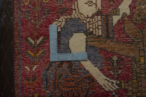 Backside of handmade 2000s Shiraz rug showing knot structure and weave density