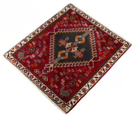 Corner detail of 2000s Shiraz rug showing border pattern and Wool pile