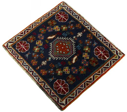 Corner detail of 2000s Shiraz rug showing border pattern and Wool pile