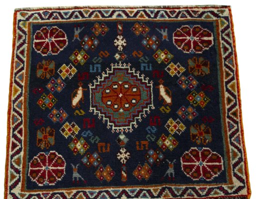 Surface texture of 2000s Shiraz rug with natural Wool and intricate pattern