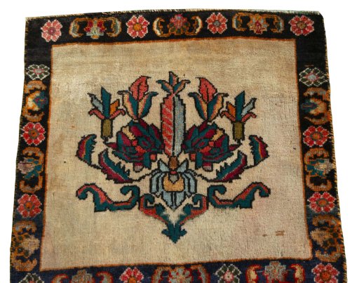 Surface texture of 2000s Shiraz rug with natural Wool and intricate pattern