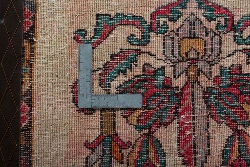 Backside of handmade 2000s Shiraz rug showing knot structure and weave density
