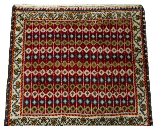 Surface texture of 2000s Shiraz rug with natural Wool and intricate pattern