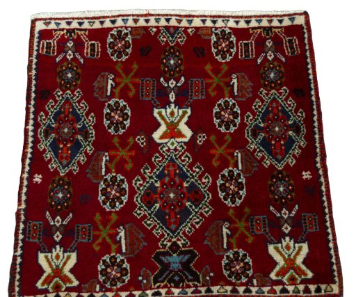 Surface texture of 2000s Shiraz rug with natural Wool and intricate pattern