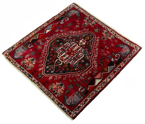 Corner detail of 2000s Shiraz rug showing border pattern and Wool pile