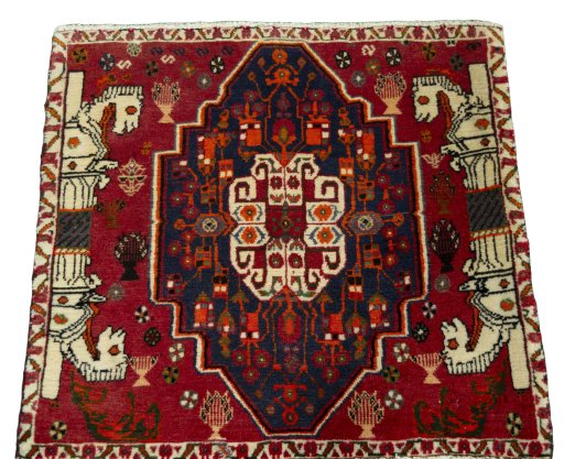 Surface texture of 2000s Shiraz rug with natural Wool and intricate pattern