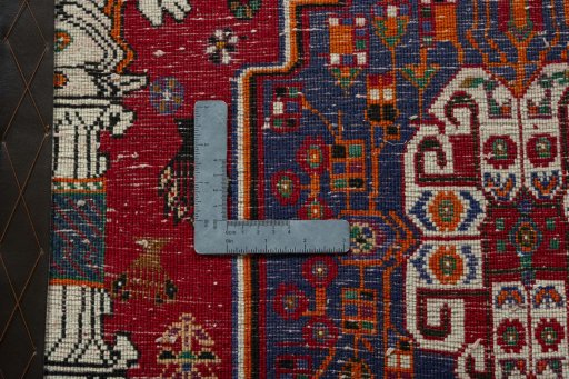 Backside of handmade 2000s Shiraz rug showing knot structure and weave density