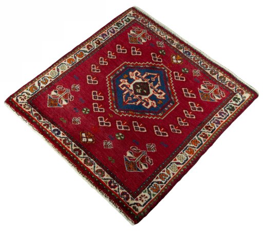 Corner detail of 2000s Shiraz rug showing border pattern and Wool pile