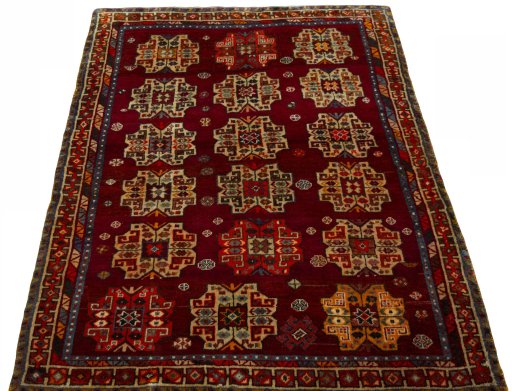 Surface texture of 2000s Shiraz rug with natural Wool and intricate pattern