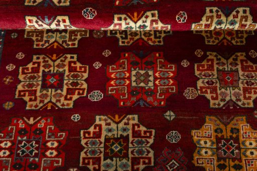 Full view of 2000s Shiraz rug from Iran / Persia, 185 × 136 cm in Red tones