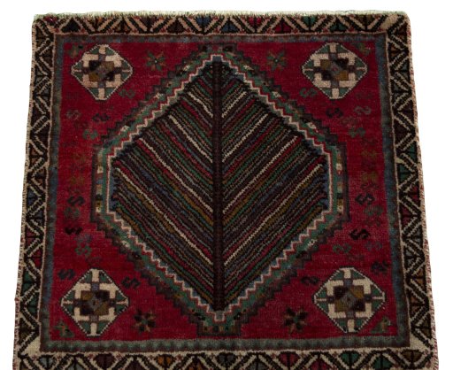 Surface texture of 2000s Shiraz rug with natural Wool and intricate pattern