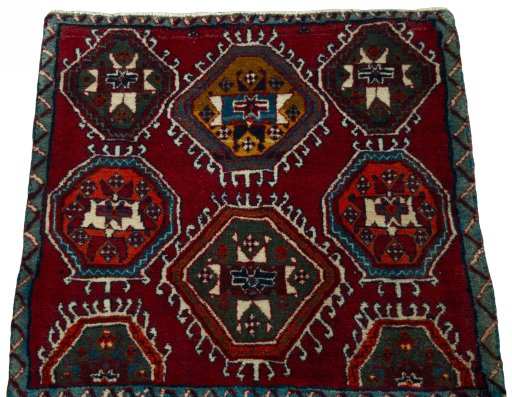 Surface texture of 2000s Shiraz rug with natural Wool and intricate pattern