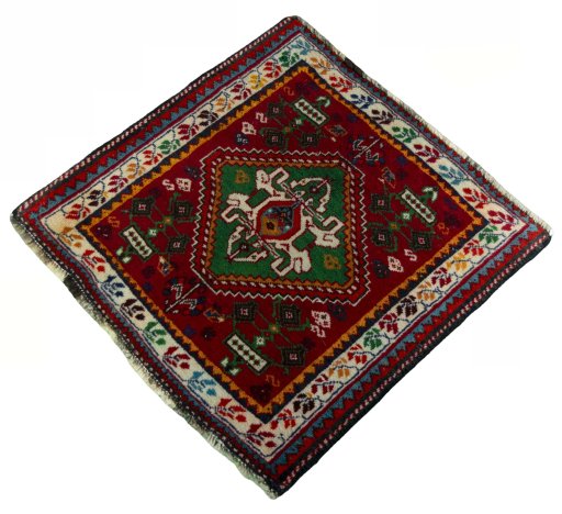 Corner detail of 2000s Shiraz rug showing border pattern and Wool pile