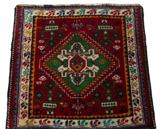 Surface texture of 2000s Shiraz rug with natural Wool and intricate pattern